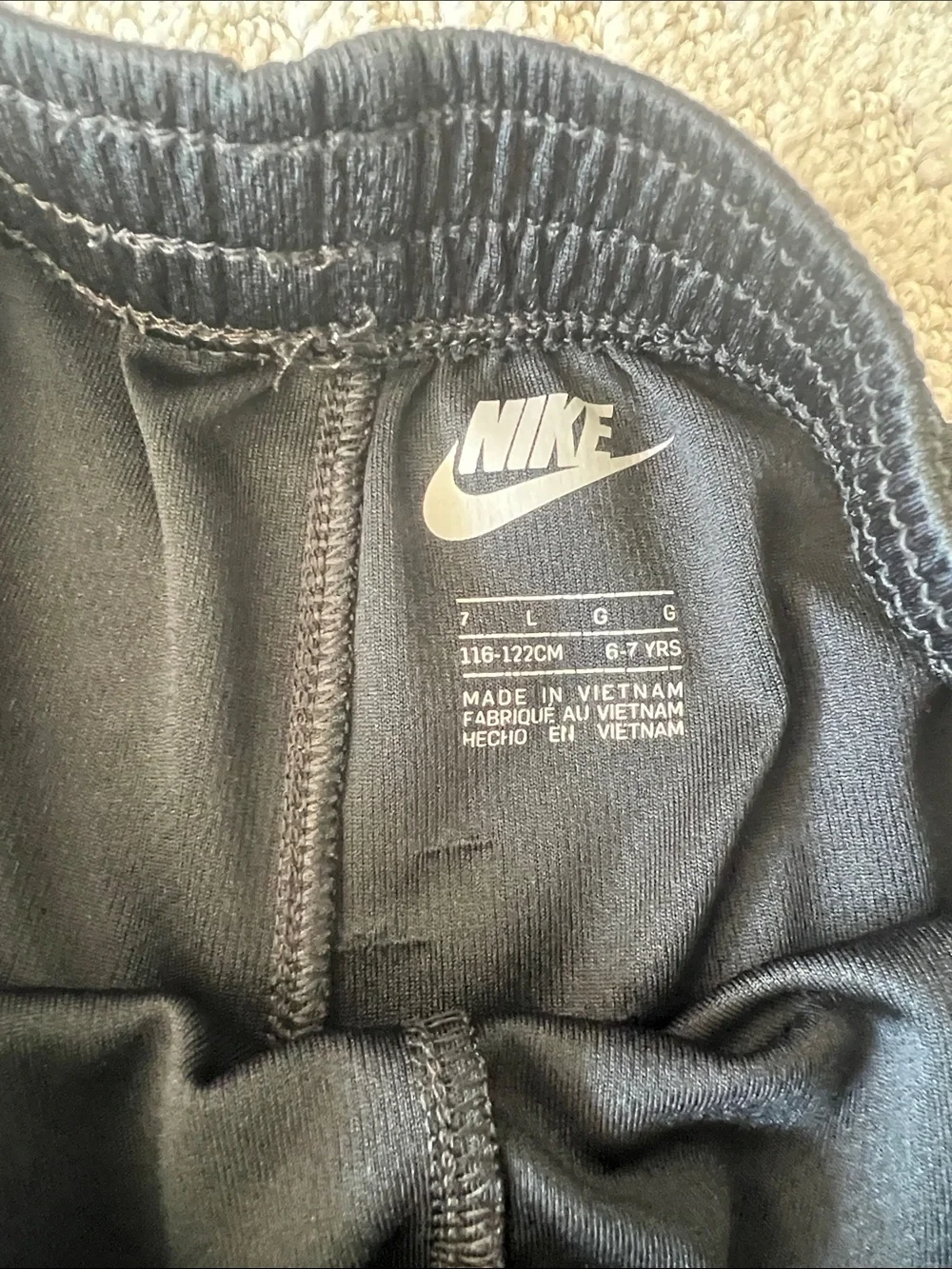 Nike Black Shorts with White Swoosh Logo
